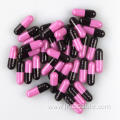 Size 00 pink black color capsule shell
